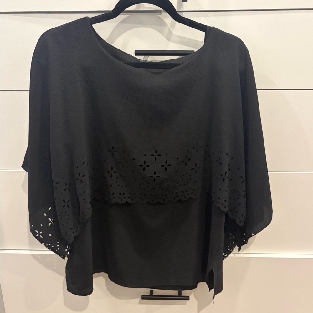 Elegant Black Blouse with Cut-Out Design